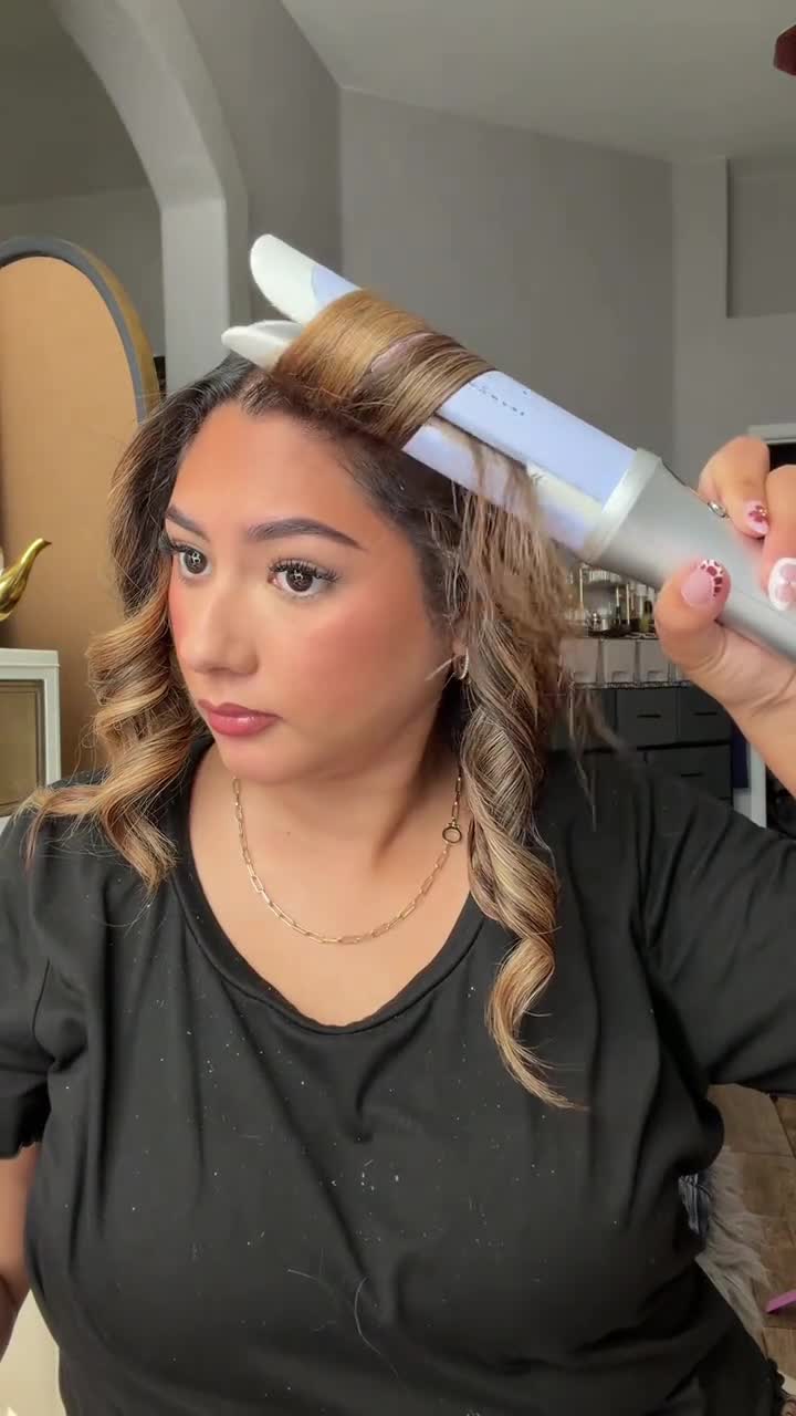Bouncy curl created with automatic rotating hair styler